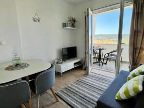 Living area - Neugebaute Wohnung im Erdgeschoss by Interhome (Karin)