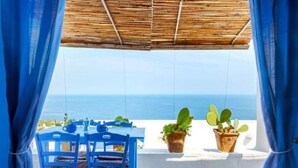 Outdoor dining - Monolokal "Blu Suite Cottage" by Interhome (Marina Serra)