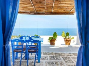 Outdoor dining - Monolokal "Blu Suite Cottage" by Interhome (Marina Serra)