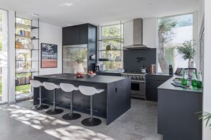 Fridge, microwave, oven, stovetop - Luxe 9BDR Retreat w/ Putting Green + Game Room | Bouldin Collective by AvantStay (Austin)