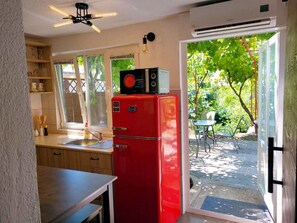 Fridge, microwave, cookware/dishes/utensils - Wohnung "Adriana" mit Terrasse by Interhome (Novi Vinodolski)