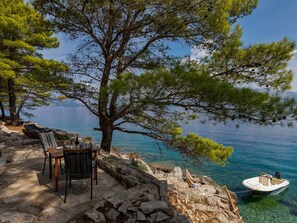 Outdoor dining - Haus in Općina Sućuraj mit Grill und Terrasse by Interhome (Hvar/Sućuraj)