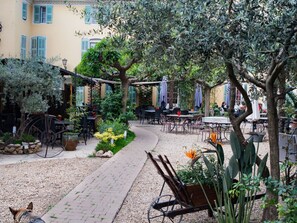 Outdoor dining - pin parasol by Interhome (Aups)
