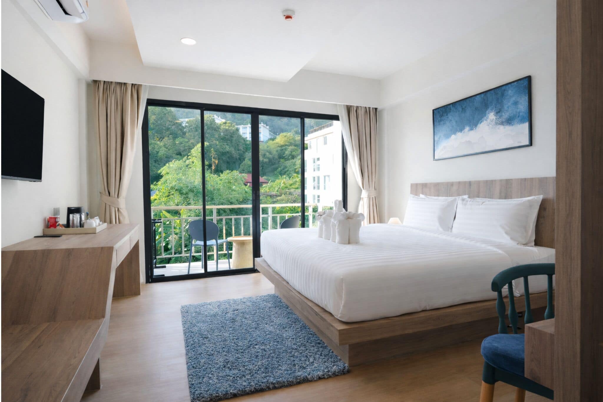 Deluxe Room, Pool View | Minibar, in-room safe, desk, free WiFi
