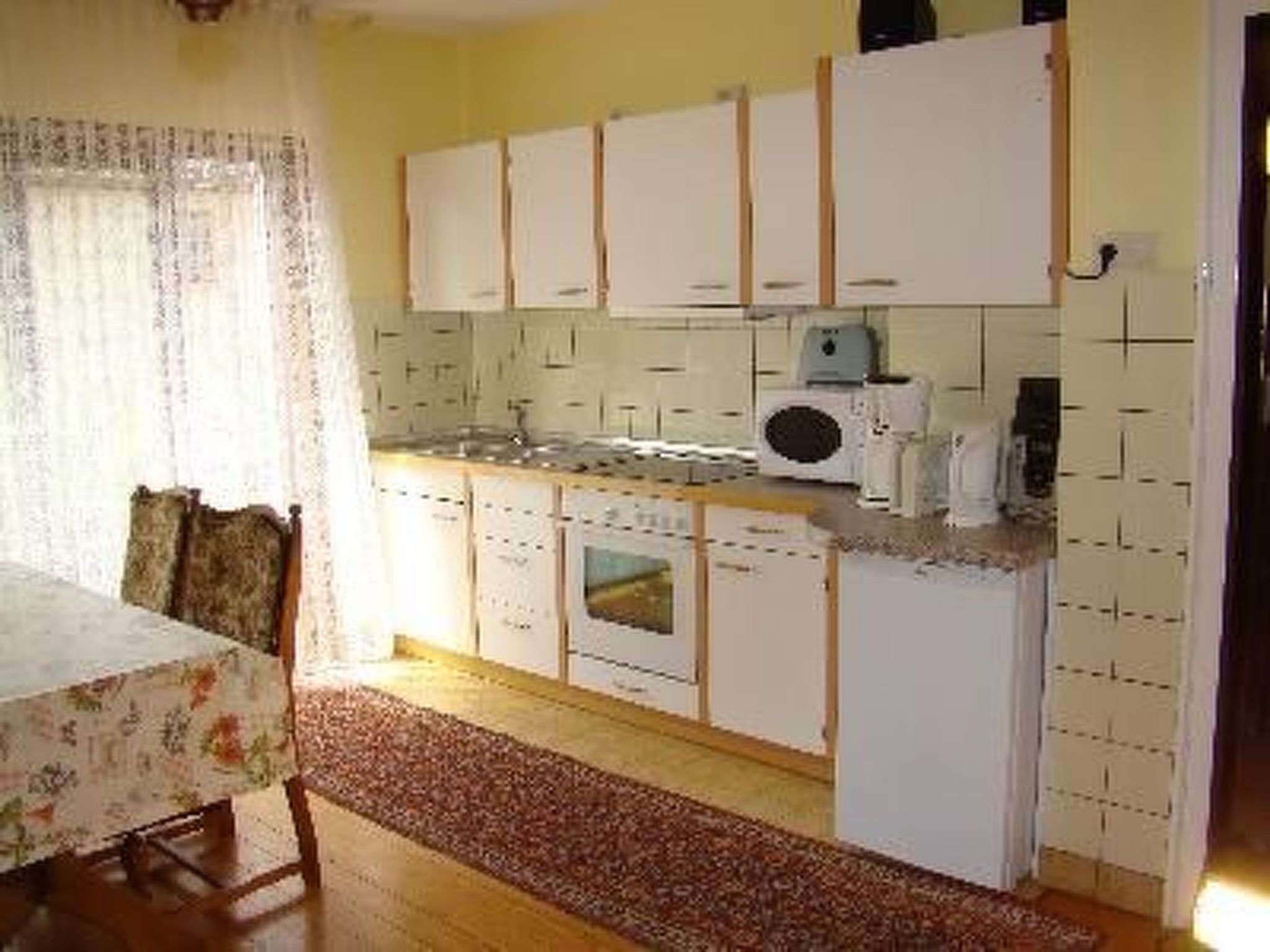 Fridge, microwave, oven, cookware/dishes/utensils