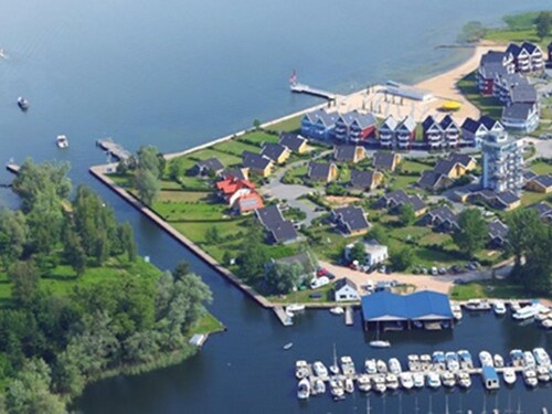 am Wasser mit Terrasse und Kaminofen by Interhome