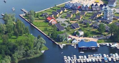 am Wasser mit Terrasse und Kaminofen by Interhome