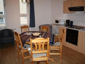 Fridge, microwave, oven, cookware/dishes/utensils
