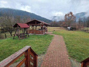 Room, Multiple Bedrooms, Smoking, Balcony | BBQ/picnic Area - Room-b&b Granada - Something Special in (Covasna)