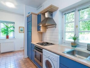 Fridge, microwave, oven, cookware/dishes/utensils