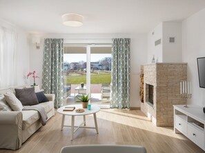 Fernseher, Kamin