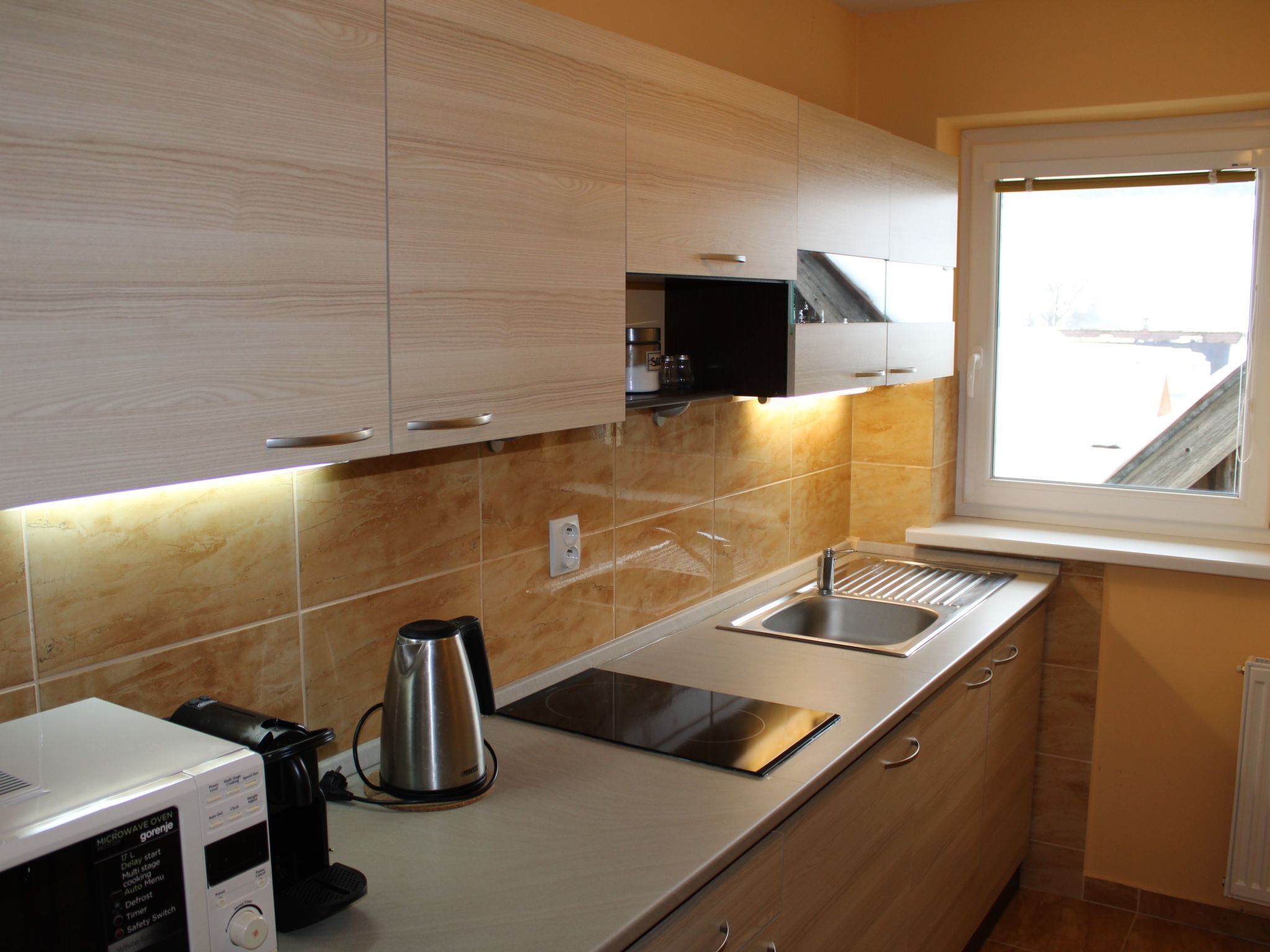 Fridge, microwave, cookware/dishes/utensils