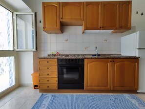 Fridge, cookware/dishes/utensils - Apartment  by Interhome (Alessandria della Rocca)