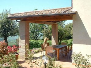 Outdoor dining - flach "Madonnino quercia by Interhome (Montaione)