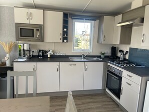 Fridge, dishwasher, cookware/dishes/utensils - Chalet in Strandnähe by Interhome (Lauwersoog)