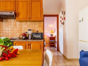 Fridge, microwave, cookware/dishes/utensils