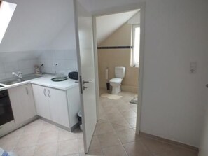 Fridge, oven, cookware/dishes/utensils