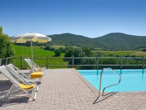 A heated pool - Ferienvilla 'Guardistallo casacce' by Interhome (Bibbona)