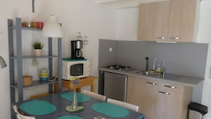 Fridge, microwave, cookware/dishes/utensils