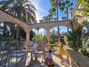Outdoor dining - Castell Villa Bohío Mallorca by Interhome (Bahia Azul)