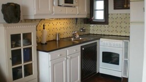 Fridge, microwave, oven, cookware/dishes/utensils