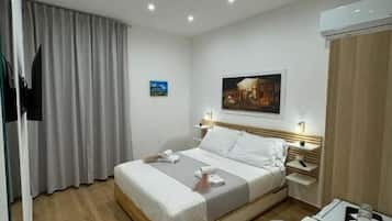 Memory foam beds, minibar, desk, blackout drapes