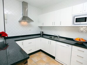 Fridge, microwave, dishwasher, cookware/dishes/utensils - Appartement in El Cotillo by Interhome (La Oliva)