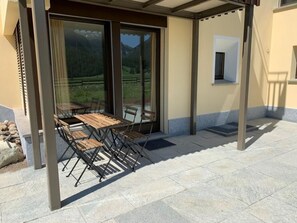 Outdoor dining - Chesa Arnica A1 by Interhome (La Punt-Chamues-ch)