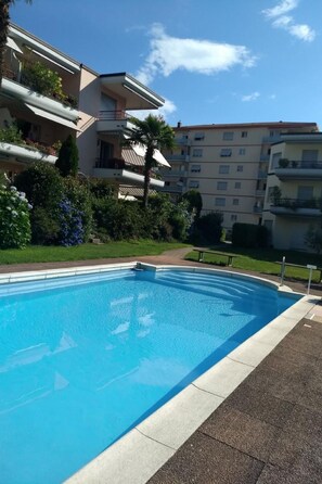 Pool - 2 Zimmer Gartenwohnung mit Pool by Interhome (Caslano)