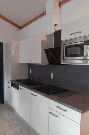 Fridge, cookware/dishes/utensils - Vacation home  by Interhome (De Haan)