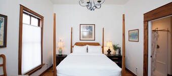 Charming historic stay in the heart of Sturgeon Bay! This studio retreat offers a warm and oh-so-cozy four-post bed, walk-in shower, a smart TV, and steps from the waterfront, all the shops and festivals!