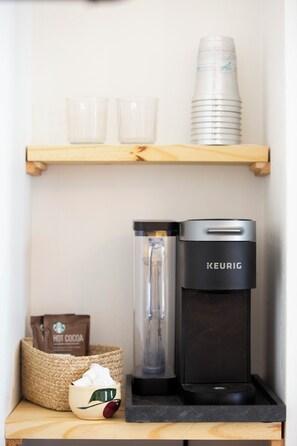 Coffee and/or coffee maker - Charming historic stay in the heart of Sturgeon Bay! This studio retreat offers a warm and oh-so-cozy four-post bed, walk-in shower, a smart TV, and steps from the waterfront, all the shops and festivals! (Sturgeon Bay)