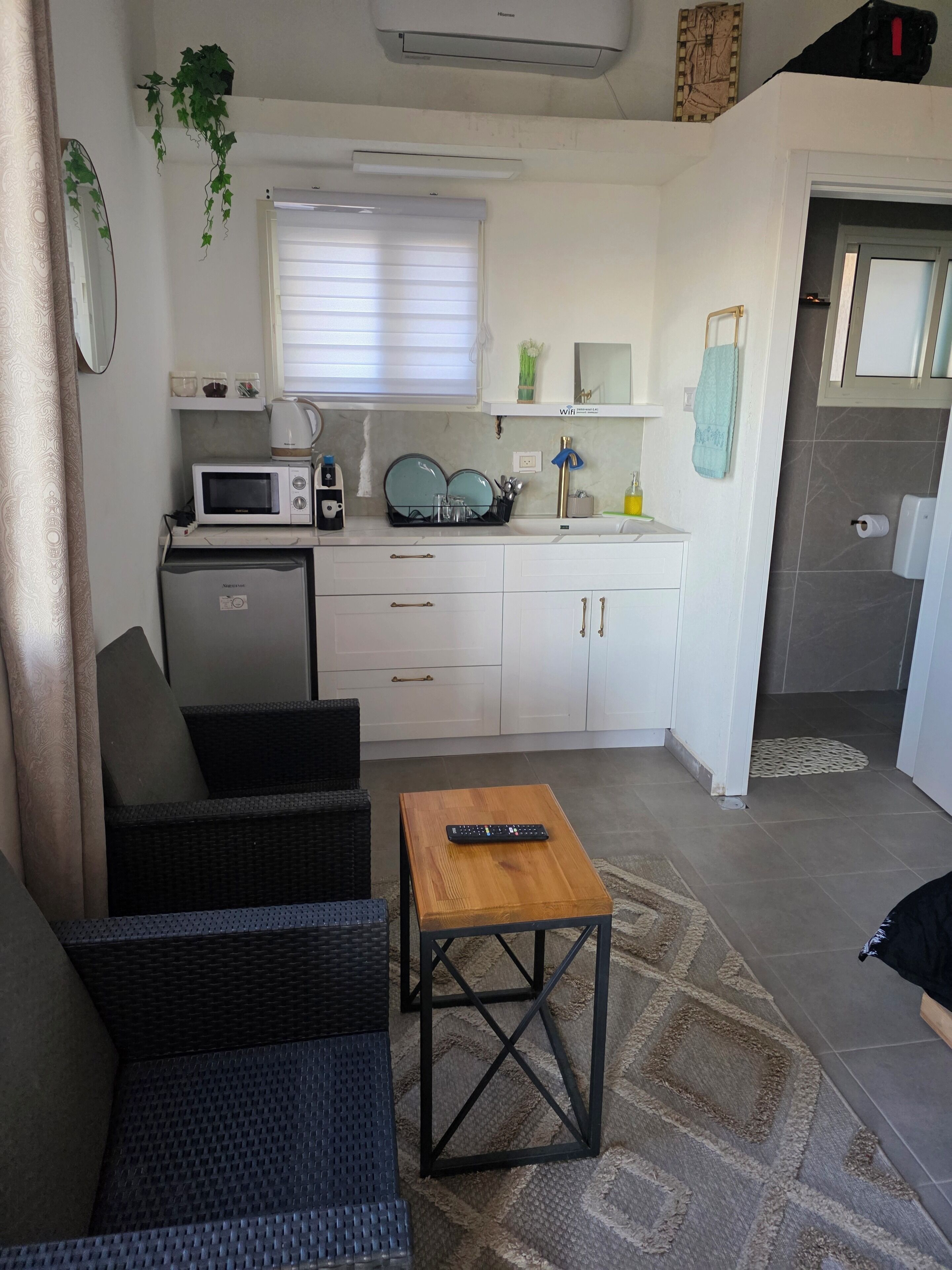 Mini-fridge, microwave, cookware/dishes/utensils