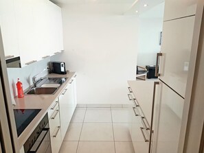 Fridge, microwave, oven, dishwasher - Modern Lake Suite Apt. 605 by Interhome (Locarno)