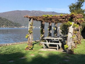 Outdoor dining - Exklusives Apartment, am Luganersee, mit Außenpool by Interhome (MAROGGIA)