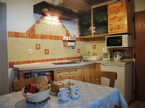 Fridge, microwave, cookware/dishes/utensils