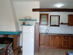 Fridge, cookware/dishes/utensils - Apartment  by Interhome (Capoliveri)