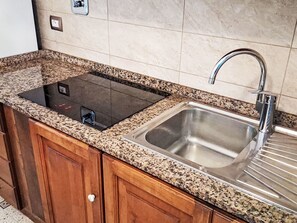 Fridge, cookware/dishes/utensils - Apartment  by Interhome (Capoliveri)