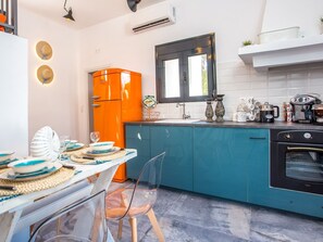 Fridge, oven, cookware/dishes/utensils - für 4 Personen ca. 79 m² in Faliraki, Ägäis (Rhodos) by Interhome (Faliraki)