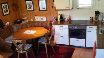 Fridge, microwave, cookware/dishes/utensils