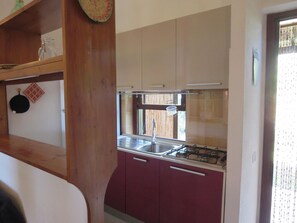 Fridge, microwave, dishwasher, cookware/dishes/utensils - trilo Mulbery mit großem Garten by Interhome (Costa Rei)