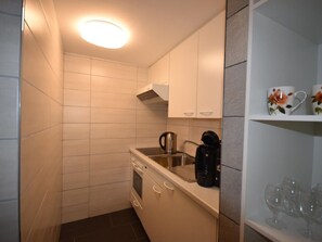Fridge, microwave, oven, cookware/dishes/utensils - Studio bim Chilchli by Interhome (Lauterbrunnen)