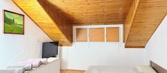 Cozy one-bedroom maisonette apartment.
