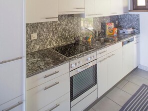 Fridge, oven, dishwasher, cookware/dishes/utensils - Residenza Viramonte - Casa Daniela, Wohnung 34 by Interhome (Vira)