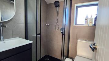 Hair dryer, towels, soap, toilet paper