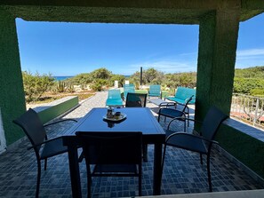 Outdoor dining - 'Villa verde' in Strandnähe by Interhome (Badesi)