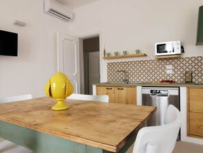 Fridge, microwave, dishwasher, cookware/dishes/utensils - "Garden Suite" by Interhome (Porto Cesareo)