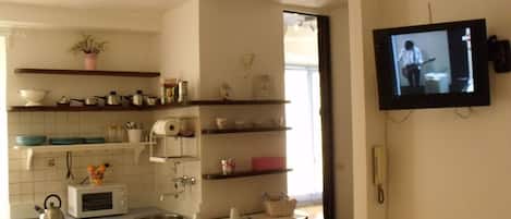 Fridge, microwave, cookware/dishes/utensils