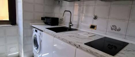 Fridge, dishwasher, cookware/dishes/utensils