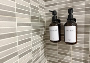 Hair dryer, towels, soap, toilet paper